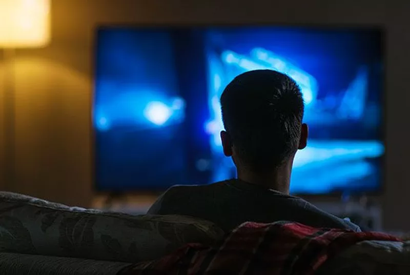 Watching TV in a dark room